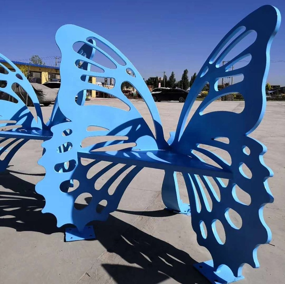 outdoor iron art park bench with butterfly sculpture for sale