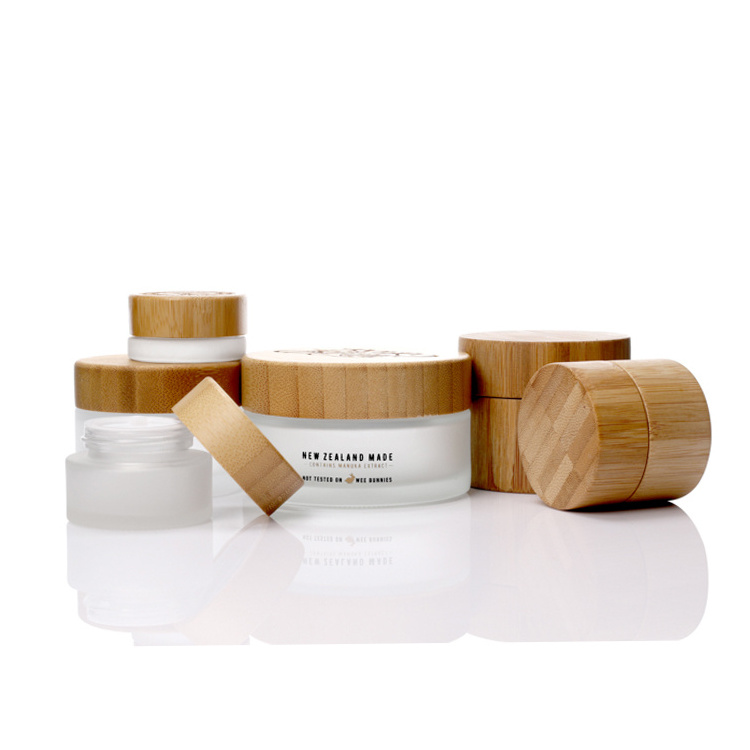 Hot sale luxury 5g 15g 30g 50g 100g 2oz 4oz bamboo cosmetic packaging frosted cream glass jars with bamboo lid