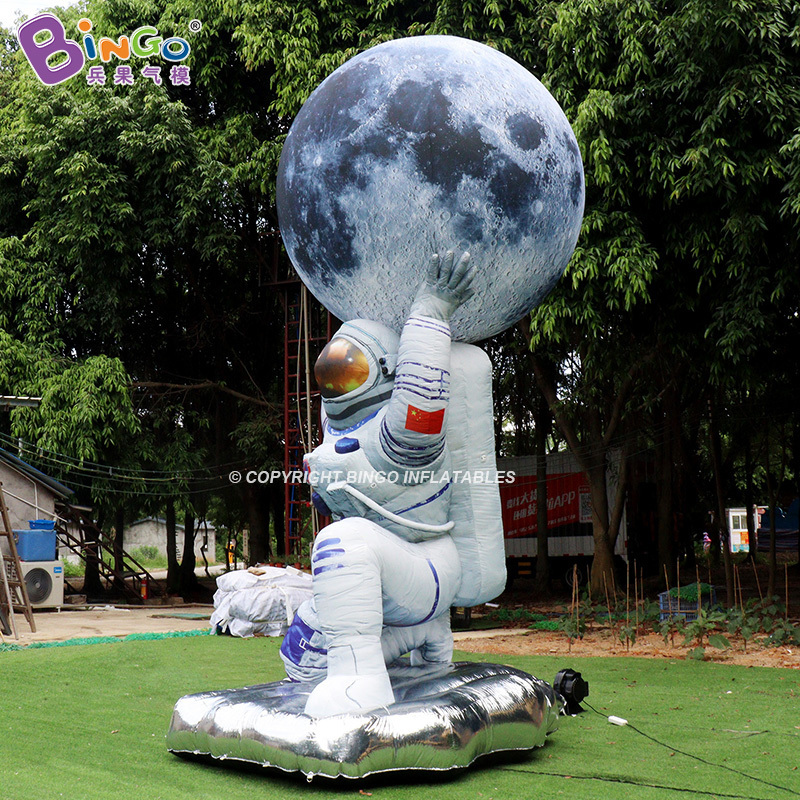 Factory design giant advertising inflatable astronaut with inflatable moon ball for event decoration 5m