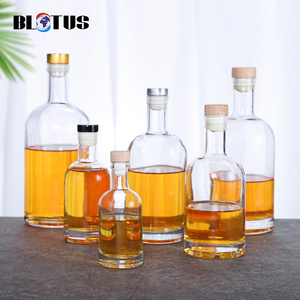 New Arrival Custom Flint Clear Round Classical Empty Whiskey Brandy Gin Rum Vodka Tequila Liquor Glass Bottle with Cork Stopper