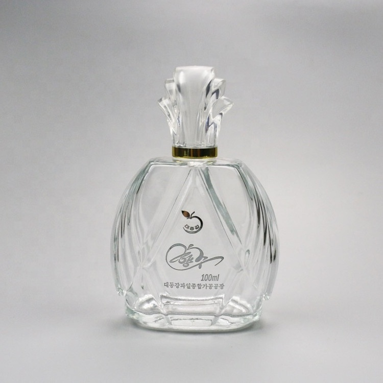 105ml custom new design perfume glass bottle with flower cap