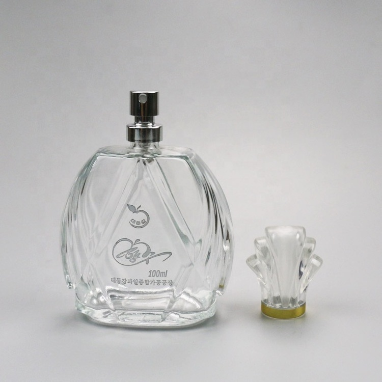 105ml custom new design perfume glass bottle with flower cap