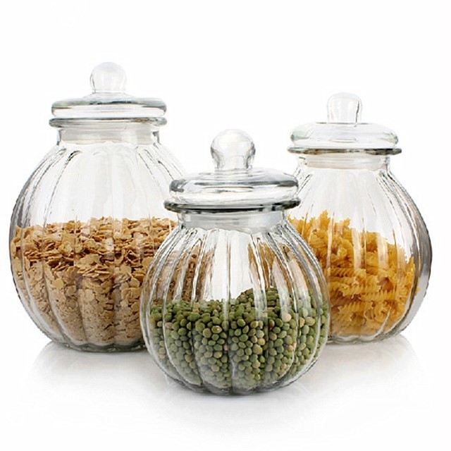 Factory price kitchen storage clear pumpkin shaped glass jars with sealed glass lids wholesale