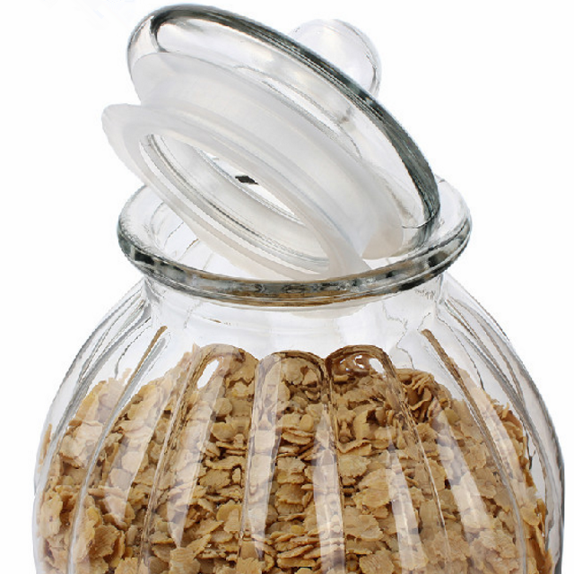 Factory price kitchen storage clear pumpkin shaped glass jars with sealed glass lids wholesale