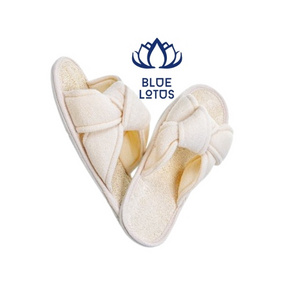 The affordable, machine-washable, waterproof, and eco-friendly Loofah slippers are available from Blue Lotus Farm.