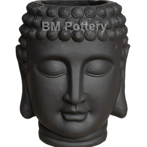 Handcrafted Red Terracotta Buddha head planter made in Vietnam for garden and indoor decor