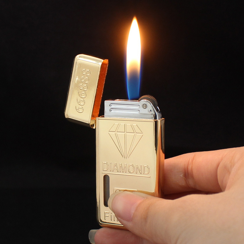 ZD1011  Wholesale of   Creative Diamond Gold Bar Grinding Wheel Lighter Metal Visual Air Chamber Inflatable Cigarette Lighter