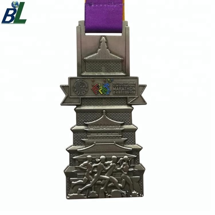 China Custom Logo Metal Craft Bronze Marathon Sports Medal with Ribbon