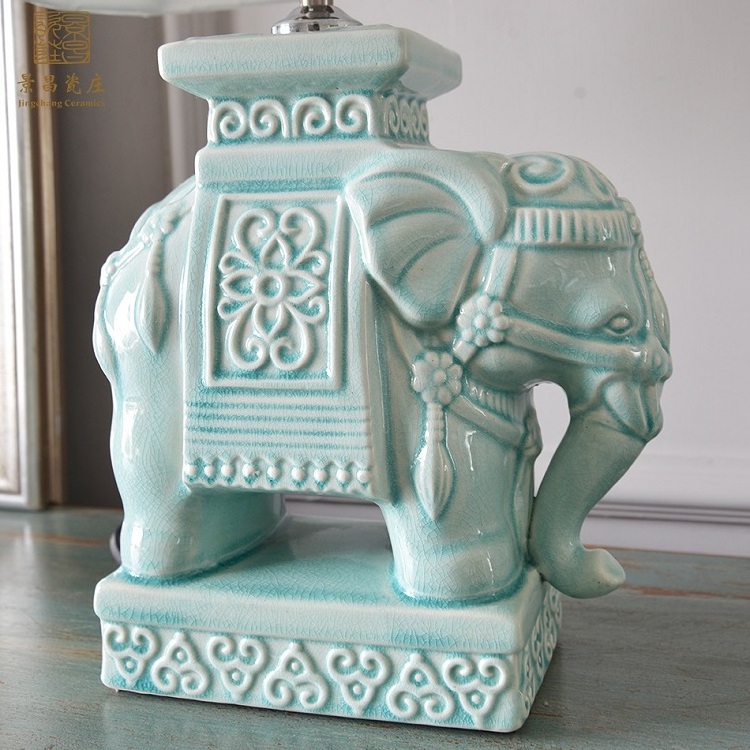 Creative fashion dynamic loaded ceramic porcelain table antique elephant lamp