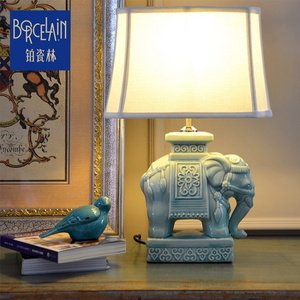 Wholesale Luxury Ceramic Home Decorative Bedside Blue Elephant Porcelain Hospitality Table Antique Bank Lamp For Living Room