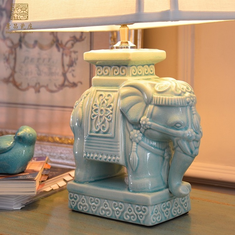 Creative fashion dynamic loaded ceramic porcelain table antique elephant lamp