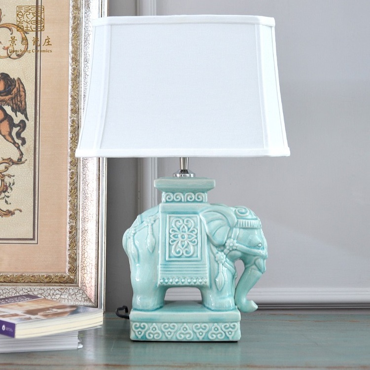 Creative fashion dynamic loaded ceramic porcelain table antique elephant lamp