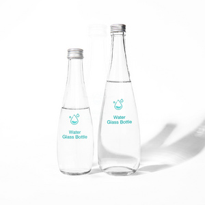 Custom Logo Empty 330ml 500ml Transparent Round Drinking Water Glass Soda Bottles With Cap