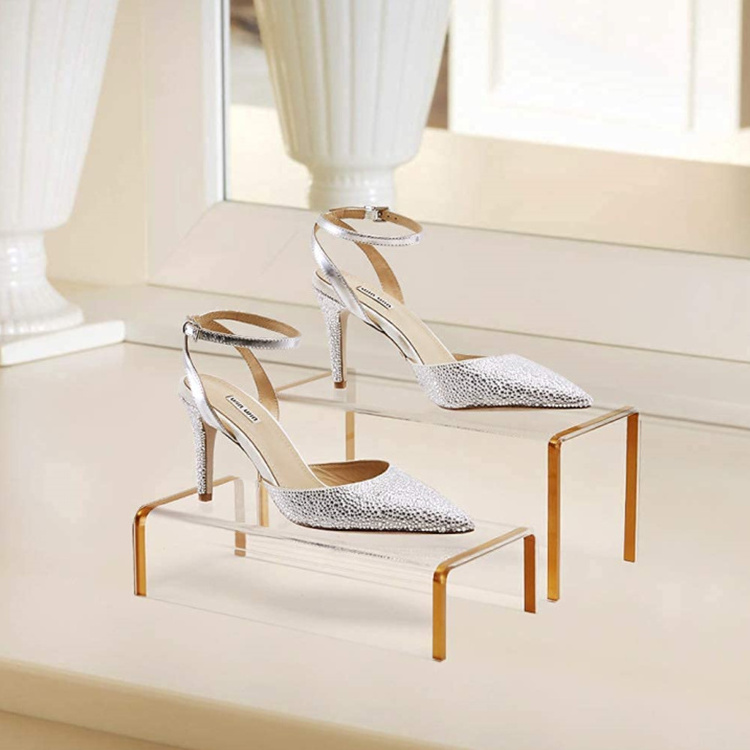 CLEAR ACRYLIC HANDBAG DISPLAY RISER ACRYLIC SHOES DISPLAY STAND WINDOW DISPLAY RACK WITH GRACEFUL GOLDEN FRAMES