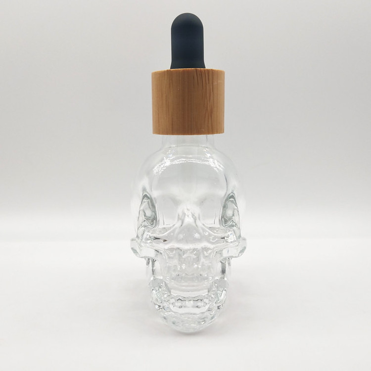 Frosted Skull Glass Essential Oil Bottle Transparent Hot Selling 30ml 60ml 120ml Skull Dropper Bottle, Black Perfume Cosmetic