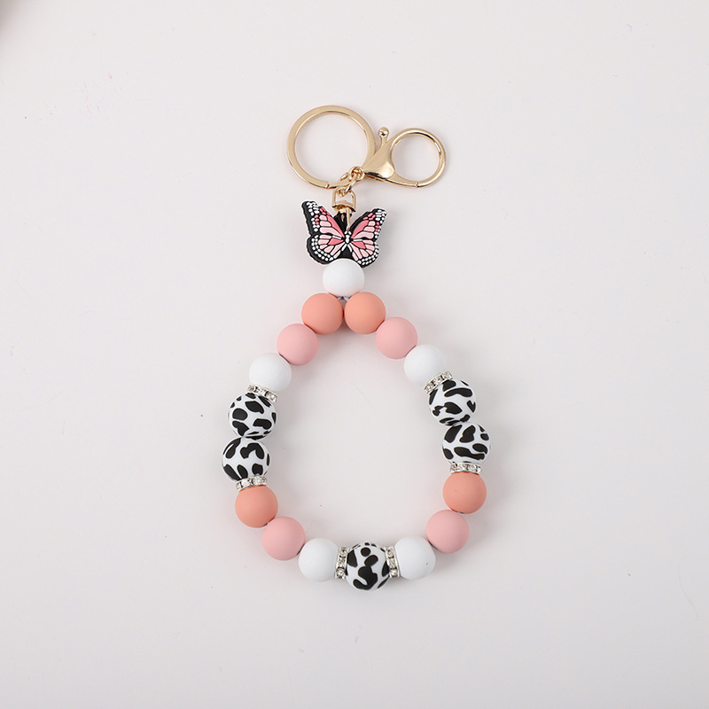 2023 New Creative Butterfly Shape Cow Silicone Beads Keychain Pendant Bracelet with Gold Buckle Rhinestone Wristlet Keychain