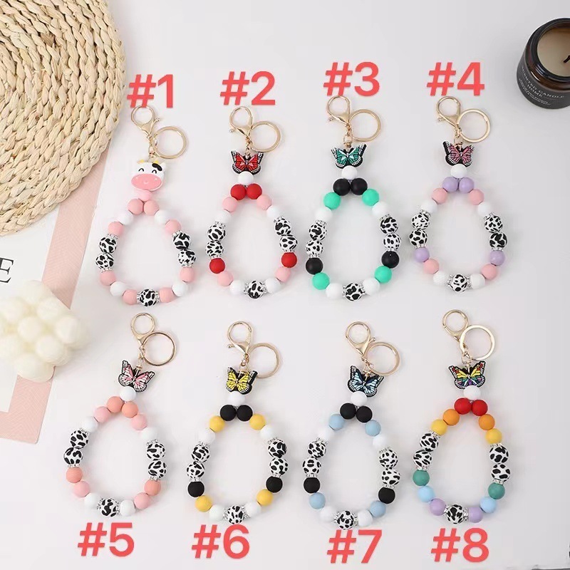 2023 New Creative Butterfly Shape Cow Silicone Beads Keychain Pendant Bracelet with Gold Buckle Rhinestone Wristlet Keychain