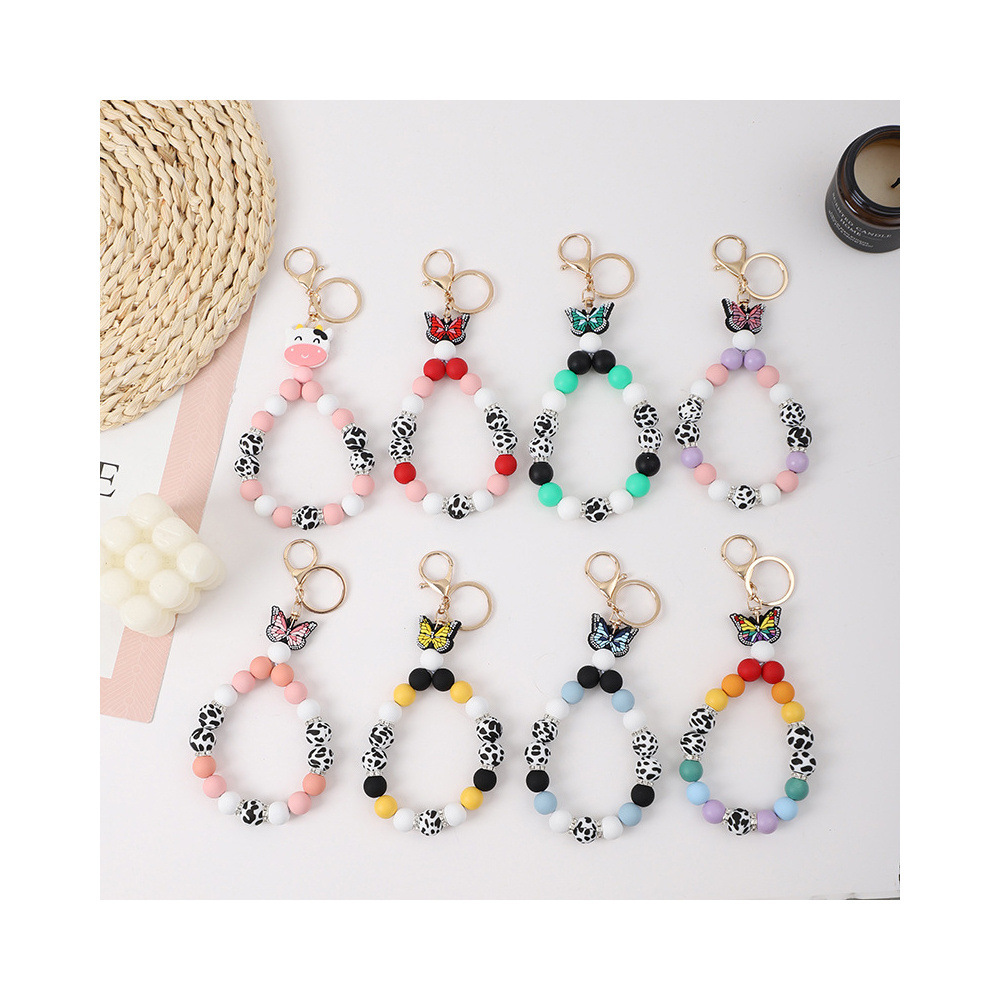 2023 New Creative Butterfly Shape Cow Silicone Beads Keychain Pendant Bracelet with Gold Buckle Rhinestone Wristlet Keychain