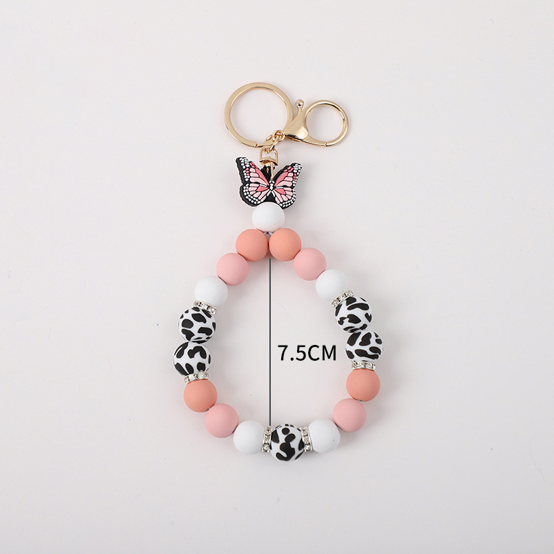 2023 New Creative Butterfly Shape Cow Silicone Beads Keychain Pendant Bracelet with Gold Buckle Rhinestone Wristlet Keychain