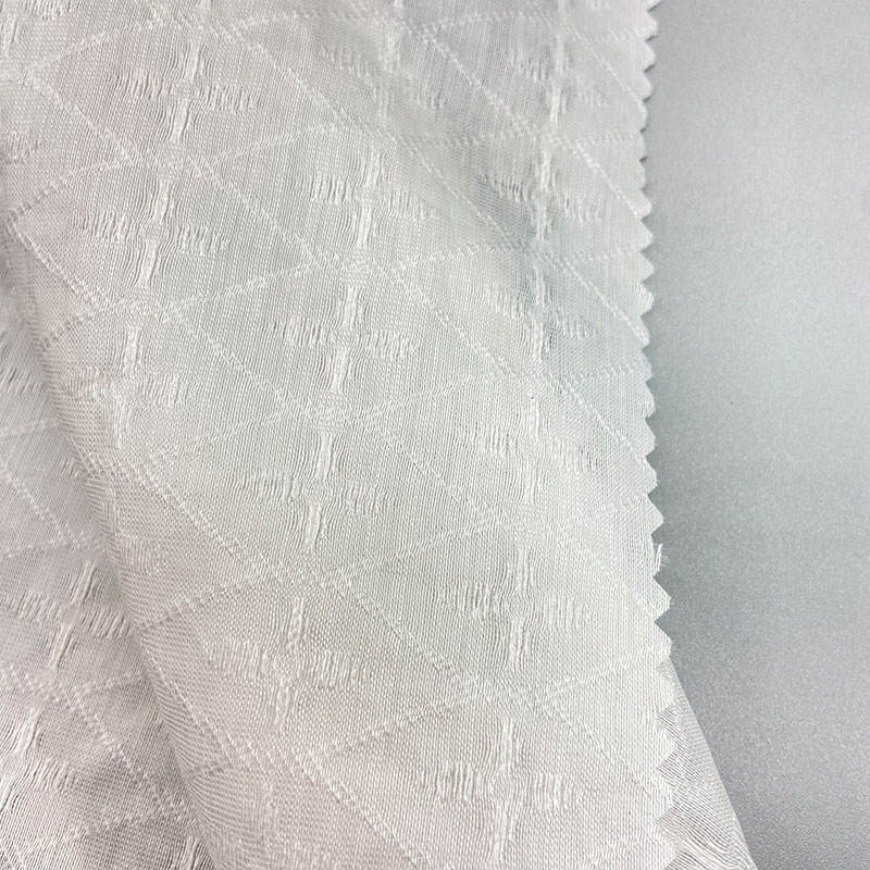 2024 New Arrival 80% Lyocell 20% Nylon 85gsm White Rhombus Woven Yarn Dyed Jacquard Fabric For Summer Dress