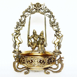 Aakrati Brass Metal Radha Krishna on swing figure Home/Event Decor Urli