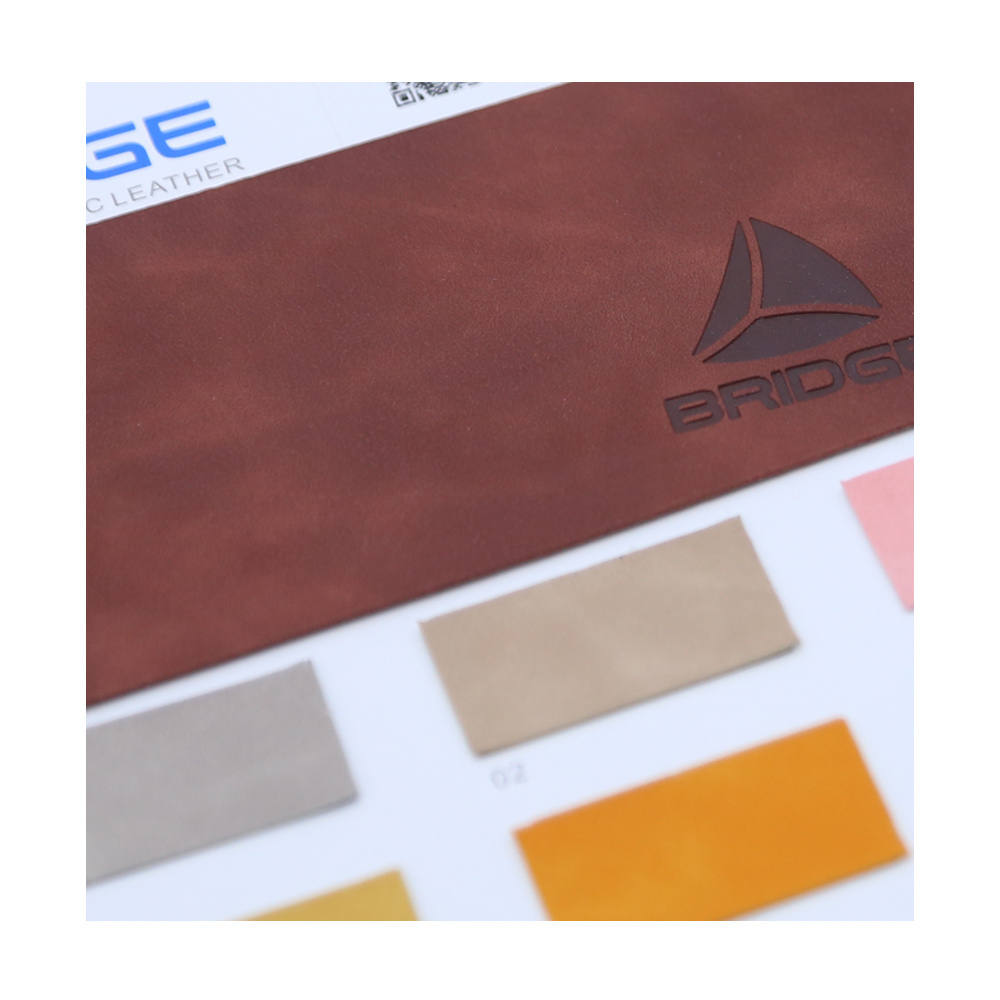 wholesale factory pressure change Color high quality Artificial Pu faux Leather fabric for Notebook and Jeans Label