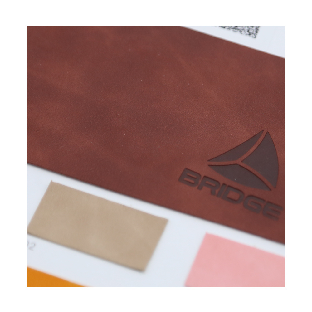 wholesale factory pressure change Color high quality Artificial Pu faux Leather fabric for Notebook and Jeans Label