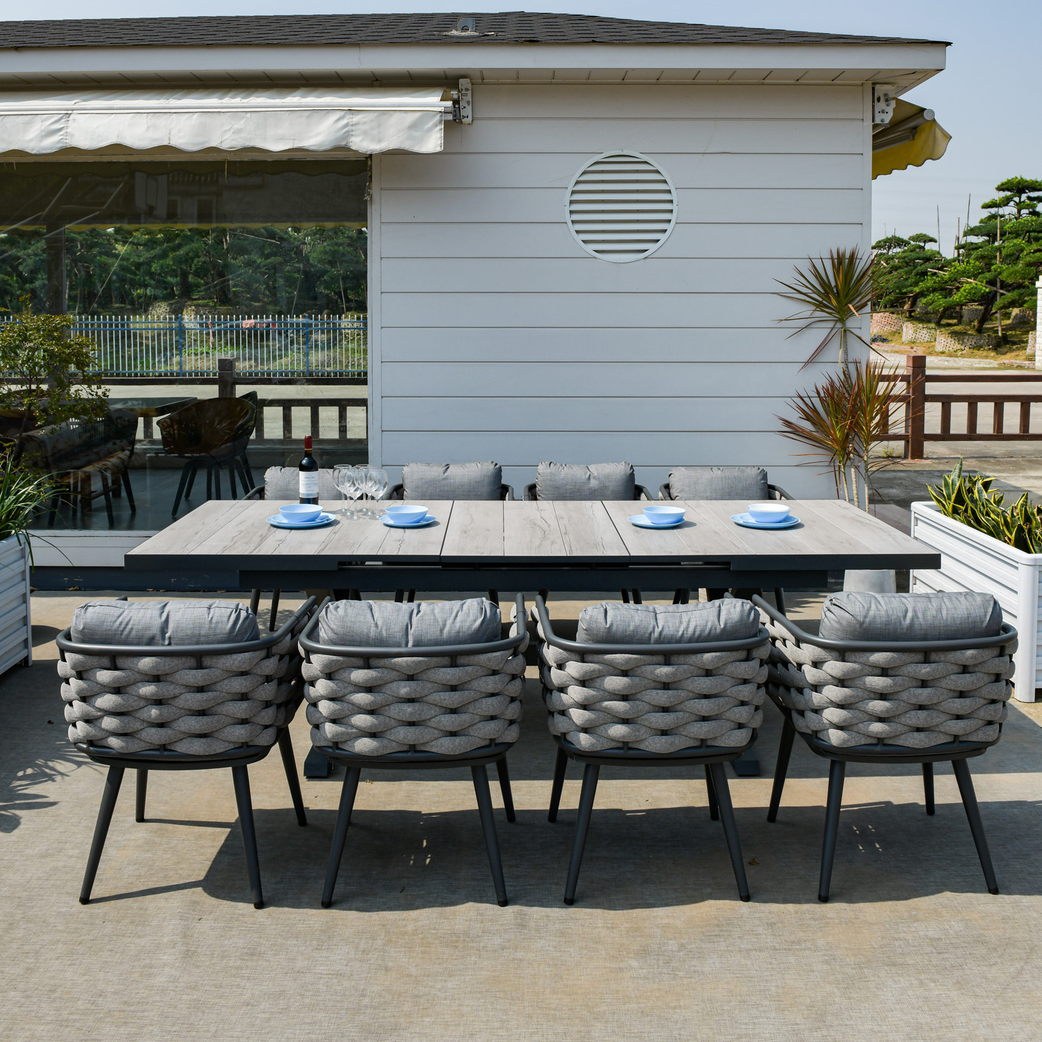 extendable expanding 203-163 cm 8 people  ceramic top aluminum frame garden dining table rope rattan chair outdoor furniture set