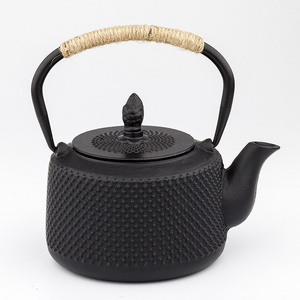 Hot selling cast iron tea pot black color kettle with stainless steel strainer healthy tea set