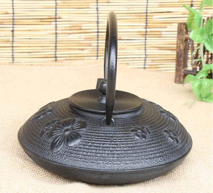 Hand-made China plum blossom Black cast iron teapot with stainless steel infuser