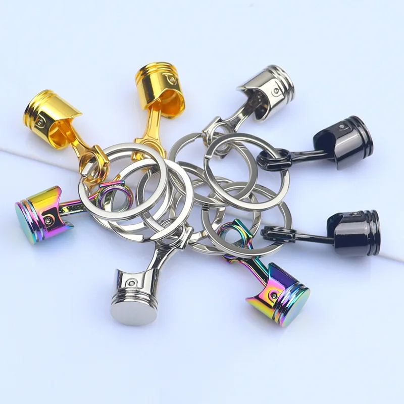 China Manufacturer No MOQ Factory Gold Nickel Rainbow Plating Auto Modification Piston Model Metal Keychains