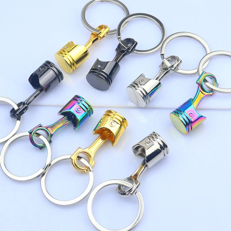 China Manufacturer No MOQ Factory Gold Nickel Rainbow Plating Auto Modification Piston Model Metal Keychains