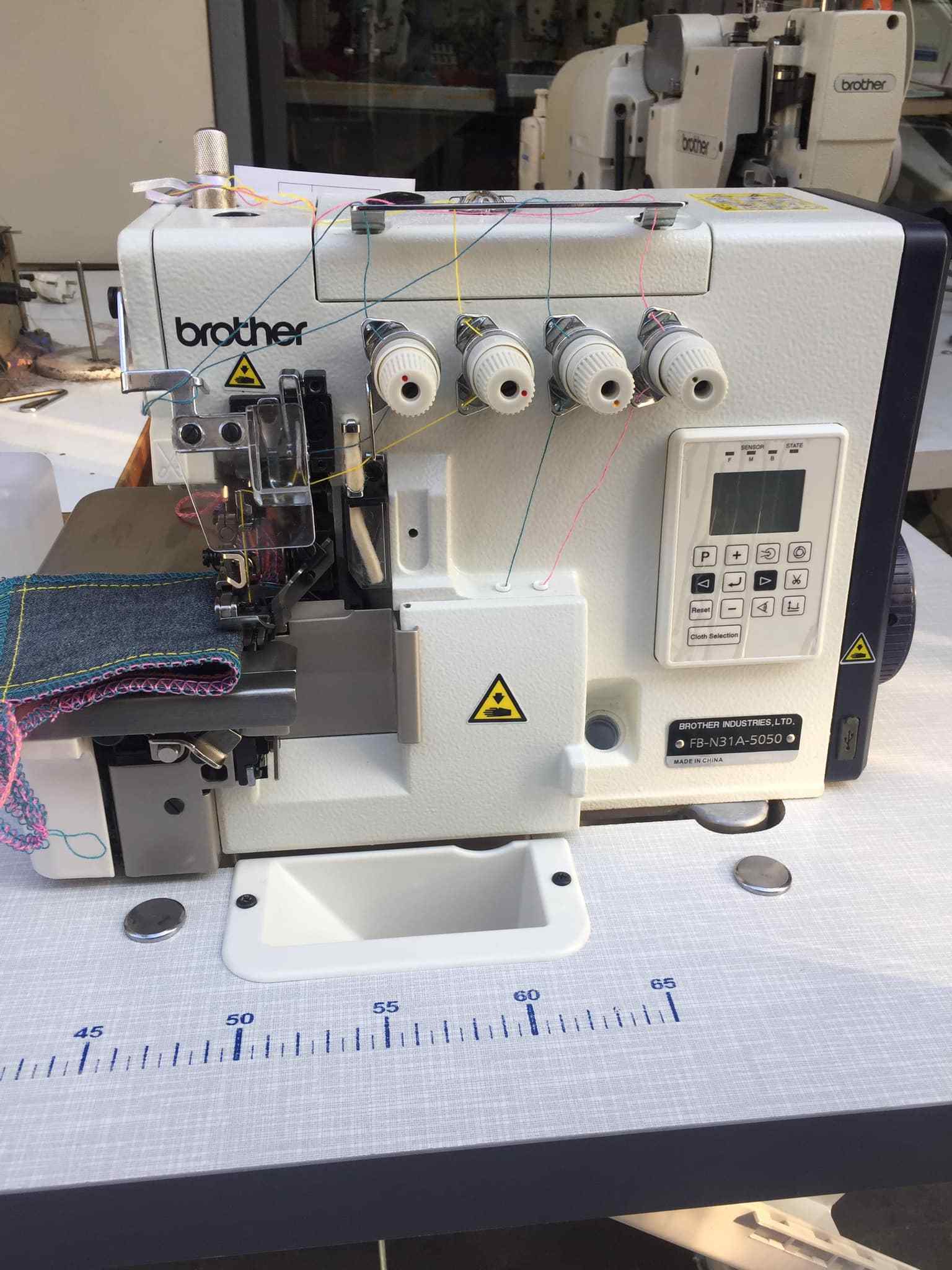 Used Computerised overlock Sewing Machine Brother FB-N21A with Electric Presser Foot Lifter