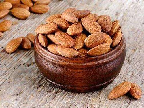 Brown 100% pure natural organic large grain almonds and raw almonds nuts for sale in bulk from USA