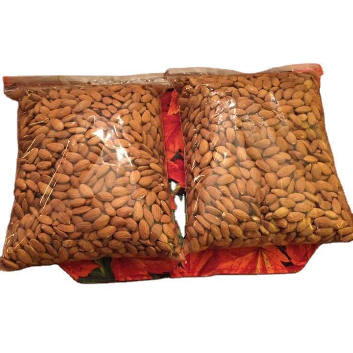 Brown 100% pure natural organic large grain almonds and raw almonds nuts for sale in bulk from USA