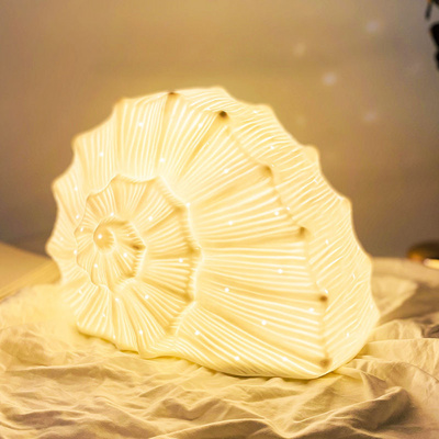 Factory Price Porcelain Night Light For Child Reading Lamp Hollow Out Table Lamp Snail Shell Craft Table Lamp