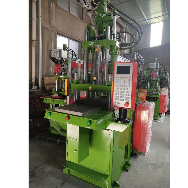 Toy eye manufacturing machine/vertical injection molding machine