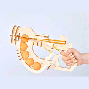 Newest hot selling shooting game DIY wooden 3D puzzle assemble ping pong guns rubber band gun shooting toys wood guns for kids