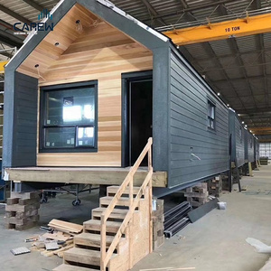 Modular tiny luxury modern light steel frame hurricane proof turnkey log cabin kits prefab houses with AU NZ EN US ICC Standard