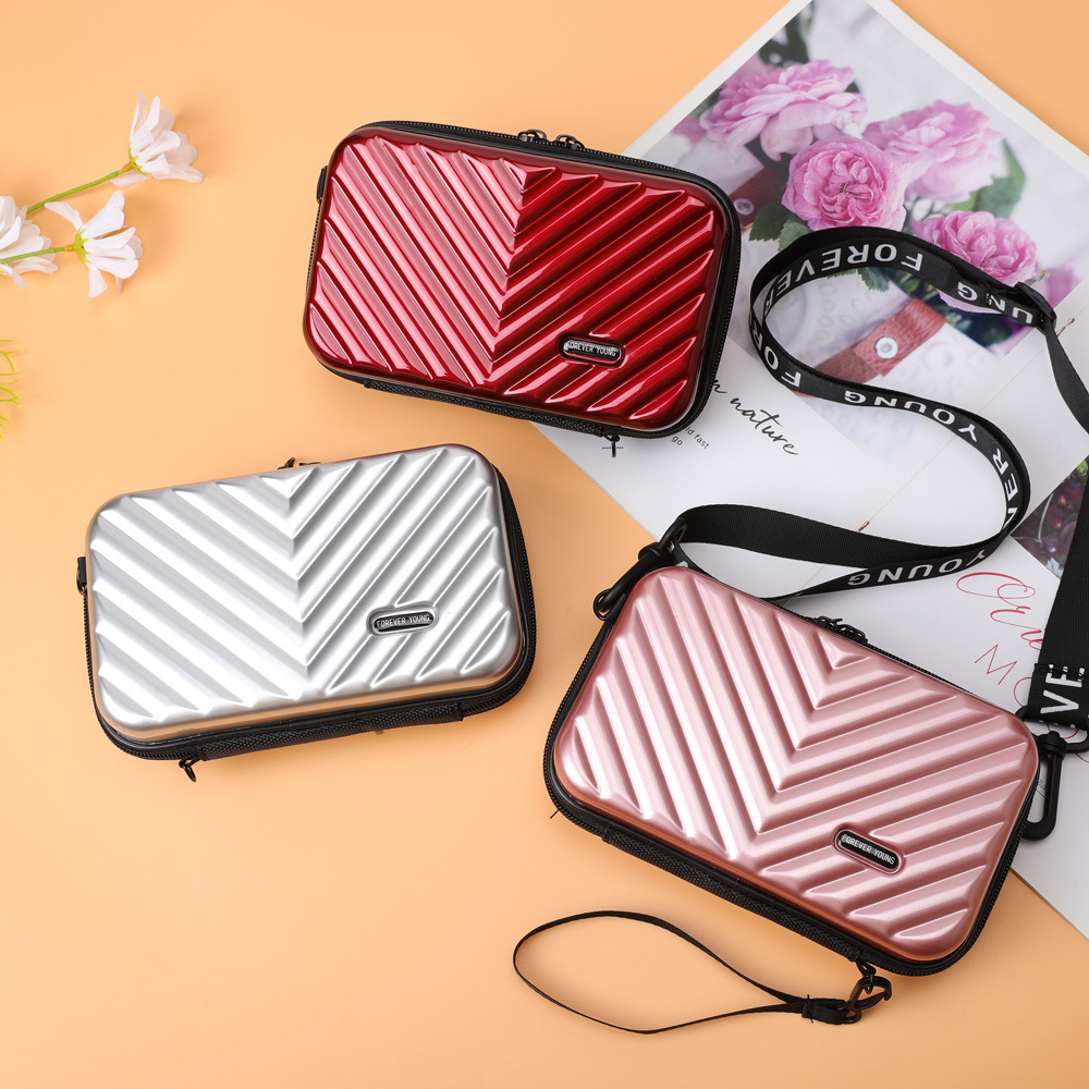 Factory wholesale new mini suitcase crossbody shoulder personality clutch small square bag Korean cosmetic bag