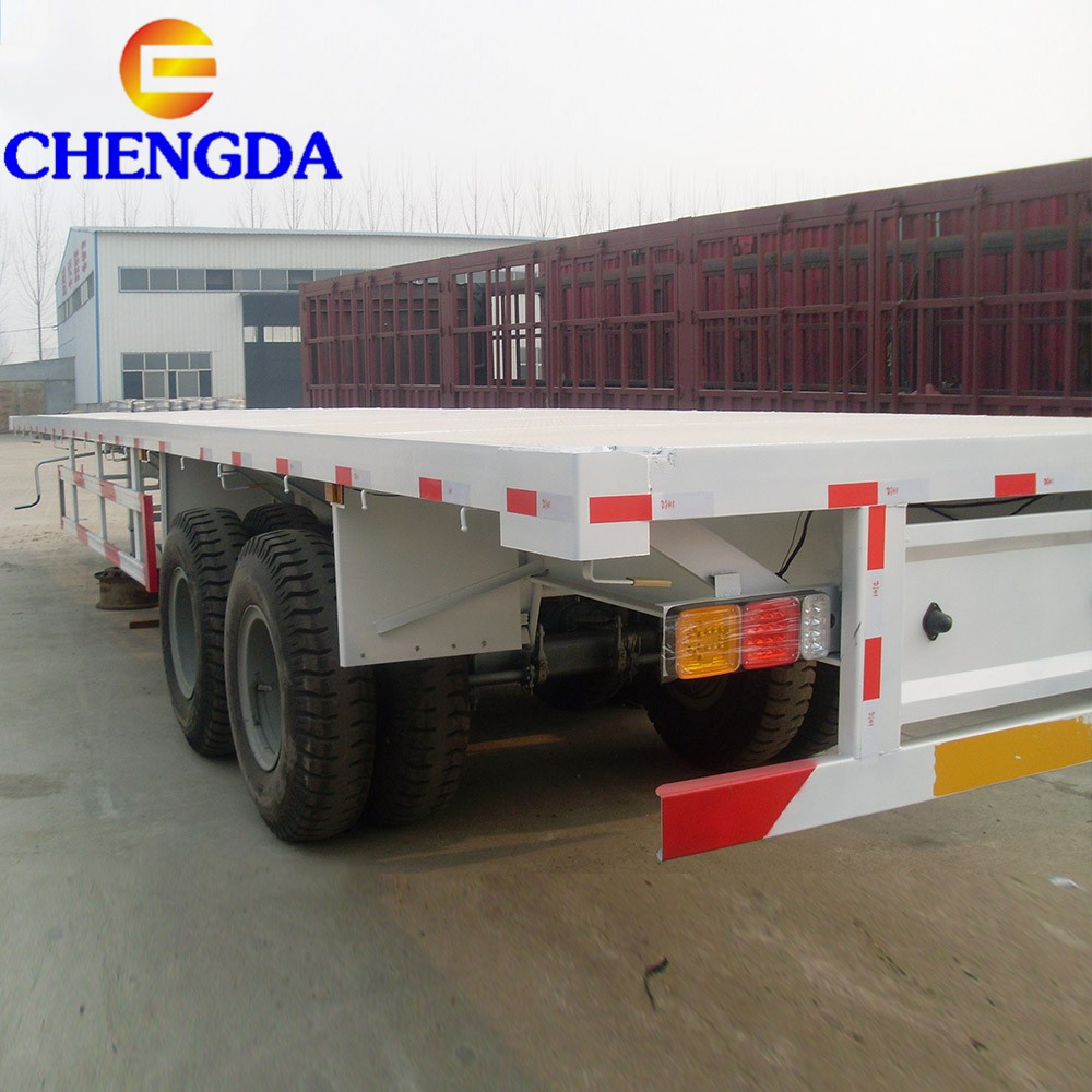 Low Price 2/3/4 Axle 20Ft 40Ft 45Ft Container Transport Flatbed Flat Bed Semi Trailer With Twist Lock