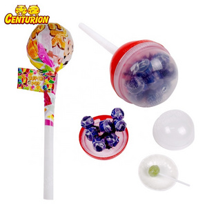 Wholesale inside halal multicolour mini fruit flavour stick lollipop candy giant plastic big bom lollipop toy