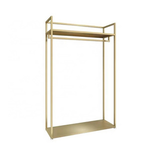 golden clothing store display stand