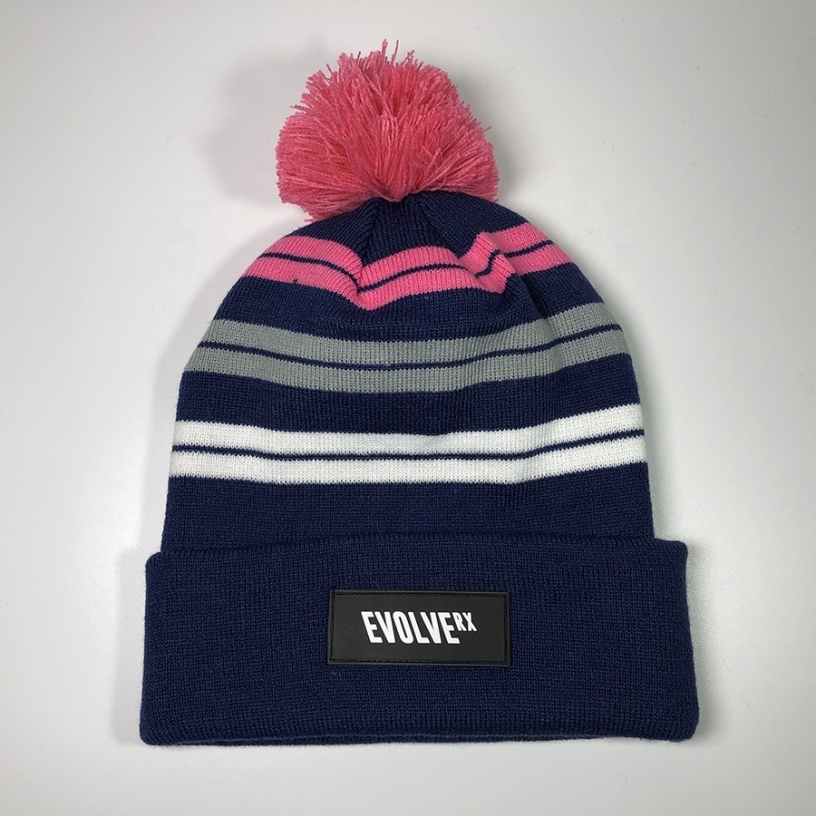 OEM popular hot sale high quality unisex winter pom pom winter hat custom jacquard design leather rubber patch stripe beanie