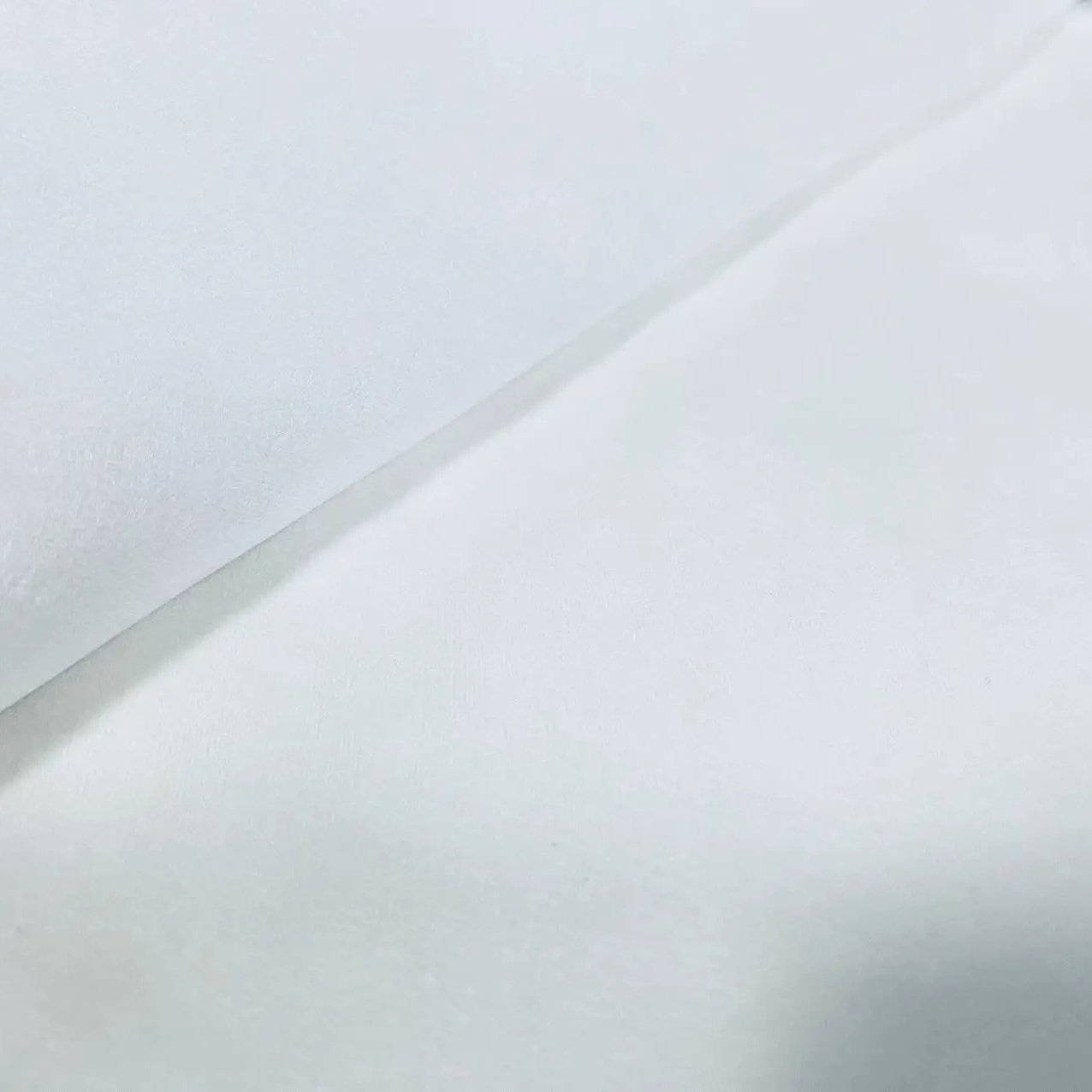 Custom adhesive mesh wet wipes non-woven spunlace cloth roll face towel raw material manufacturers spunlace non-woven fabric