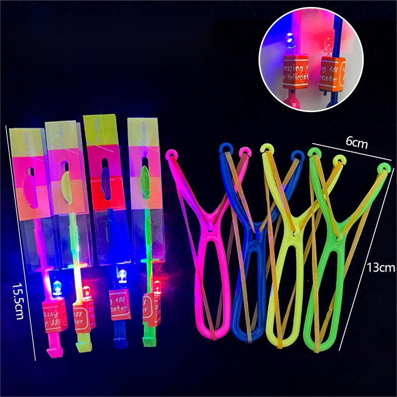 Wholesale of luminescent slingshots flying arrows blue lights double flashing children's gifts night market floor stalls toys