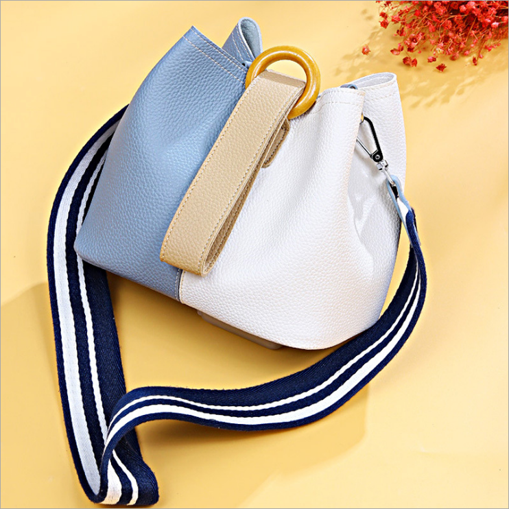 2019 new leather handbags bucket bag retro handbags Guangzhou manufacturers wholesale foreign trade women's big bag diagonal