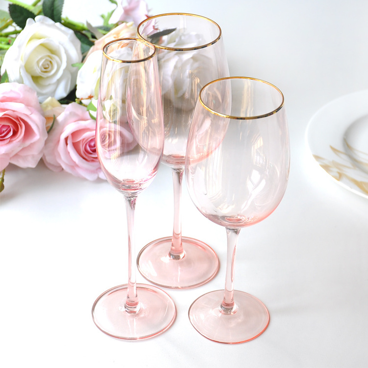 custom high end clear glassware  pink stemmed  goblets colored gold rim  red wine goblet with logo