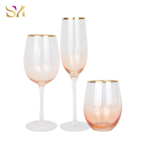 custom high end clear glassware  pink stemmed  goblets colored gold rim  red wine goblet with logo