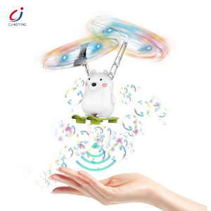 Chengji summer outdoor blower maker machine hand control induction helicopter flying bear plane light up bubble toy